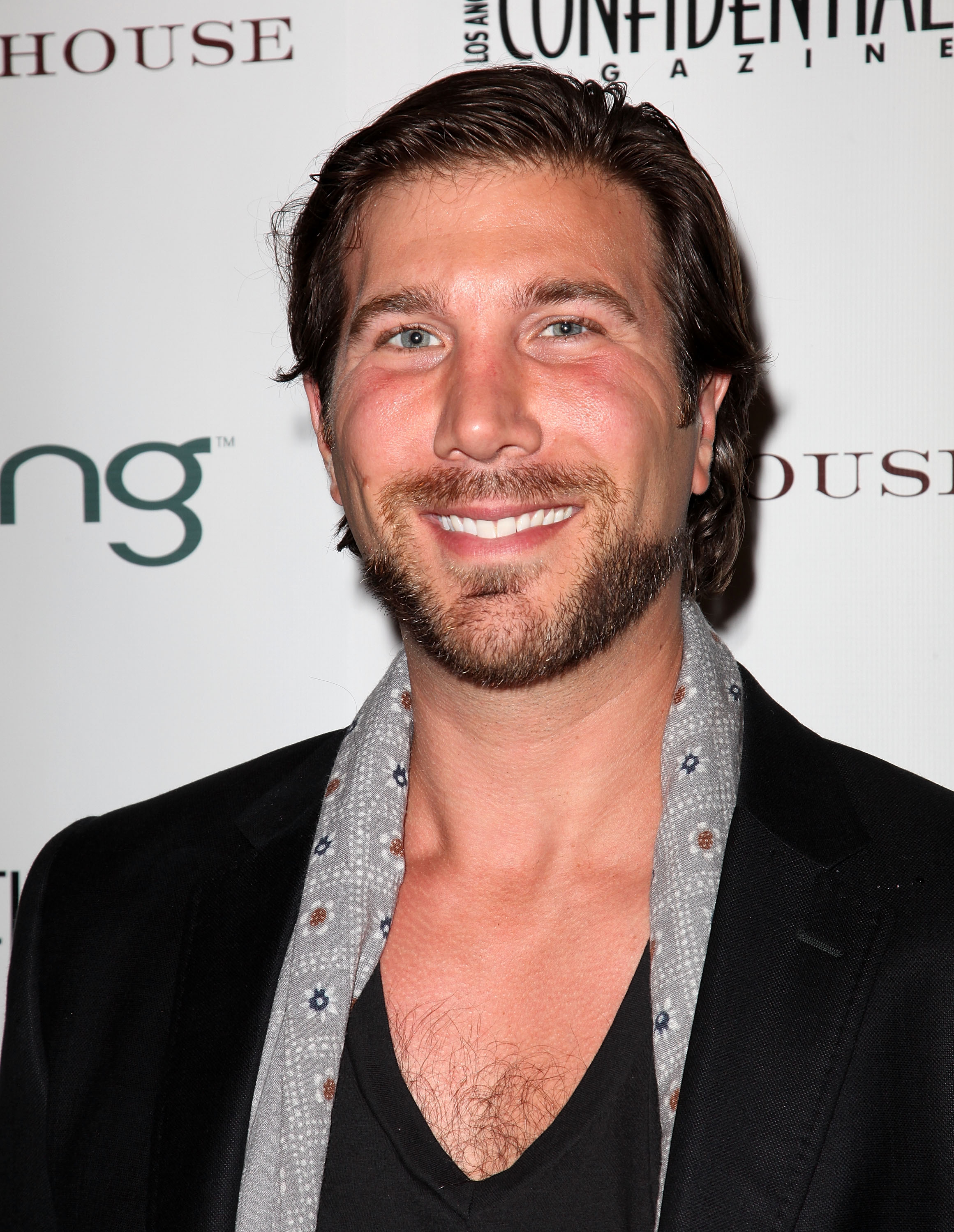 A photo of Aaron Rollins smiling at a party in West Hollywood in 2011.